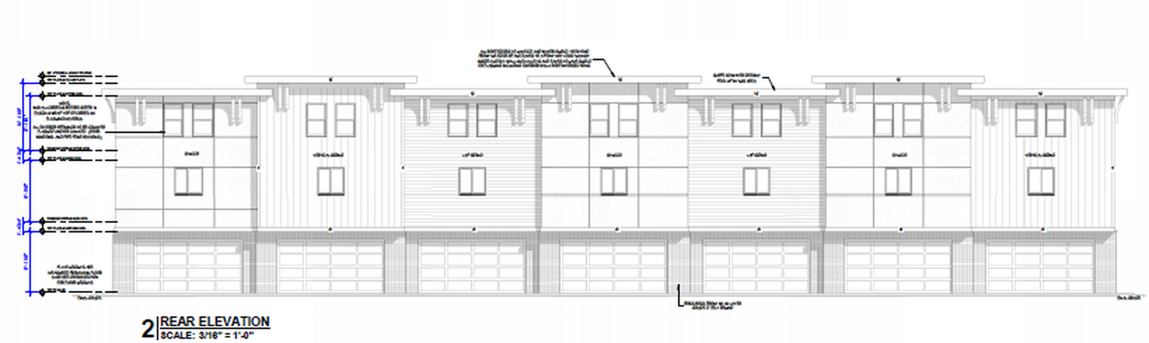 Original preliminary rear elevation with garage doors